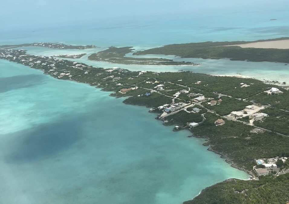 View from the airplane over Turks and Caicos, home to our first international project