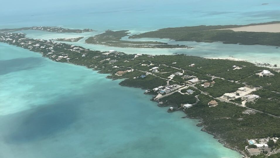 View from the airplane over Turks and Caicos, home to our first international project