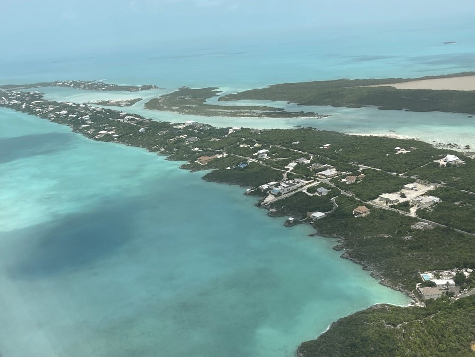 View from the airplane over Turks and Caicos, home to our first international project