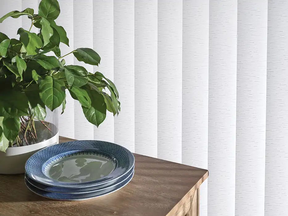 Fabric vertical blinds near end table