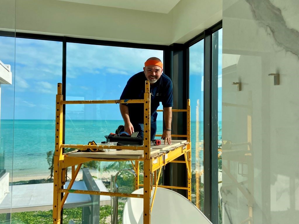 Roger Magalhaes at an installation site in Turks and Caicos