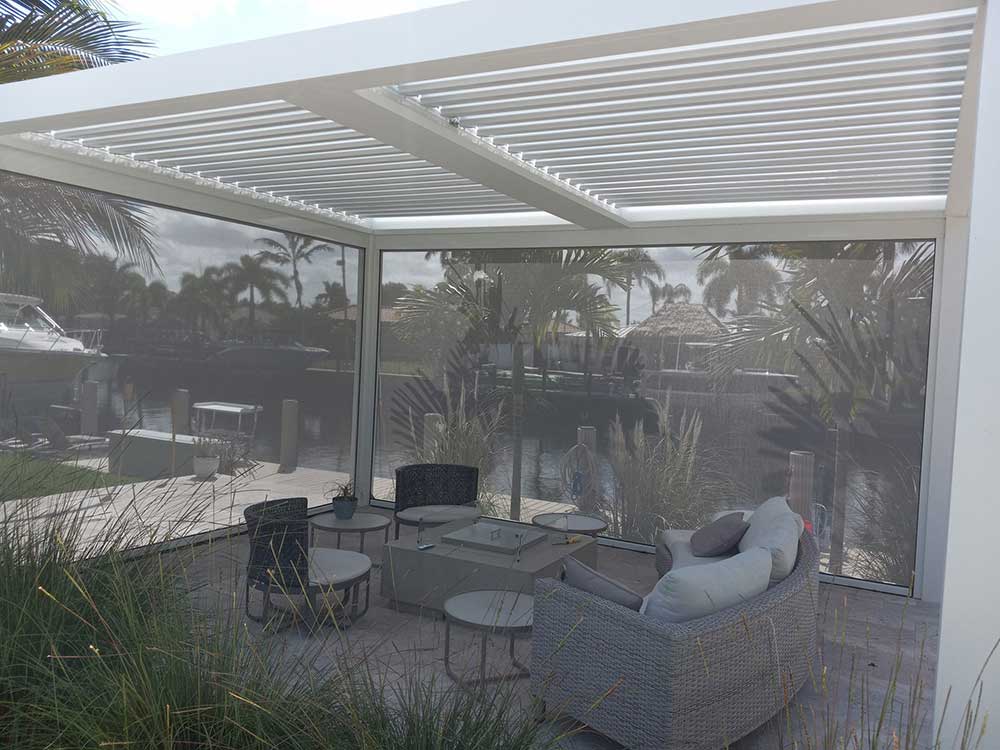 Inside Florida patio with screens down overlooking at river