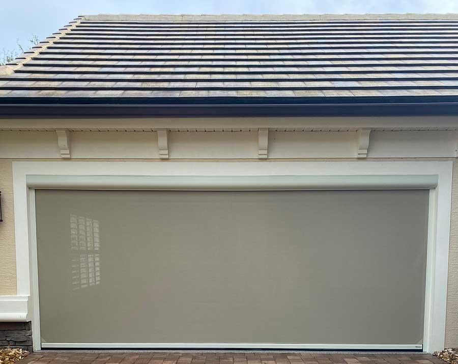 Facing garage door with vinyl screen down