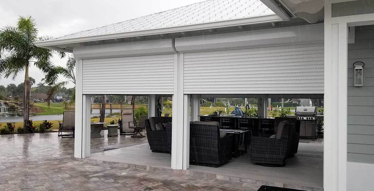 Roll down white shutters on patio